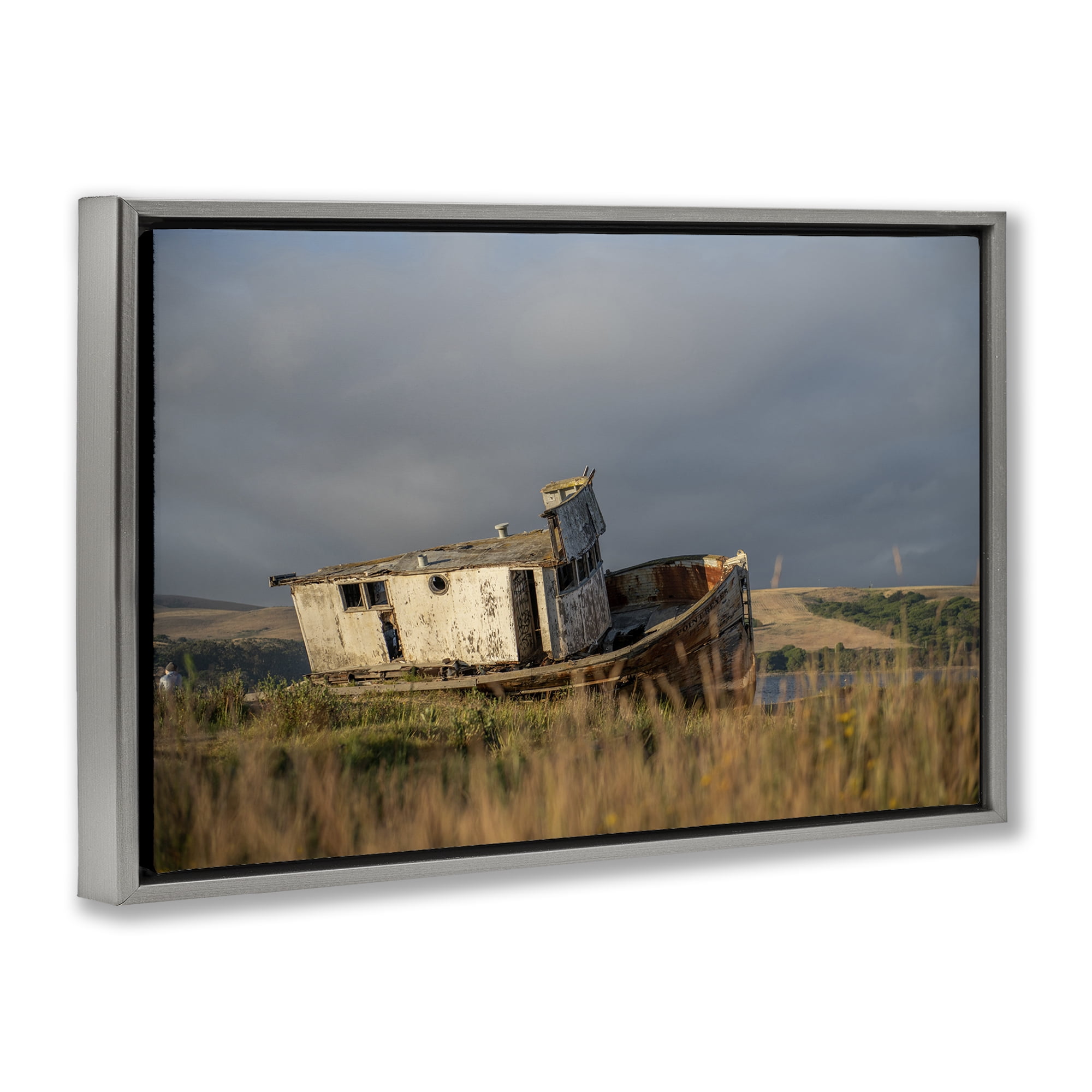 Stupell Industries Old Shipwreck on Beach Landscape & Nature Photography Gray Floater Framed Canvas Art Print Wall Art, 25 x 17