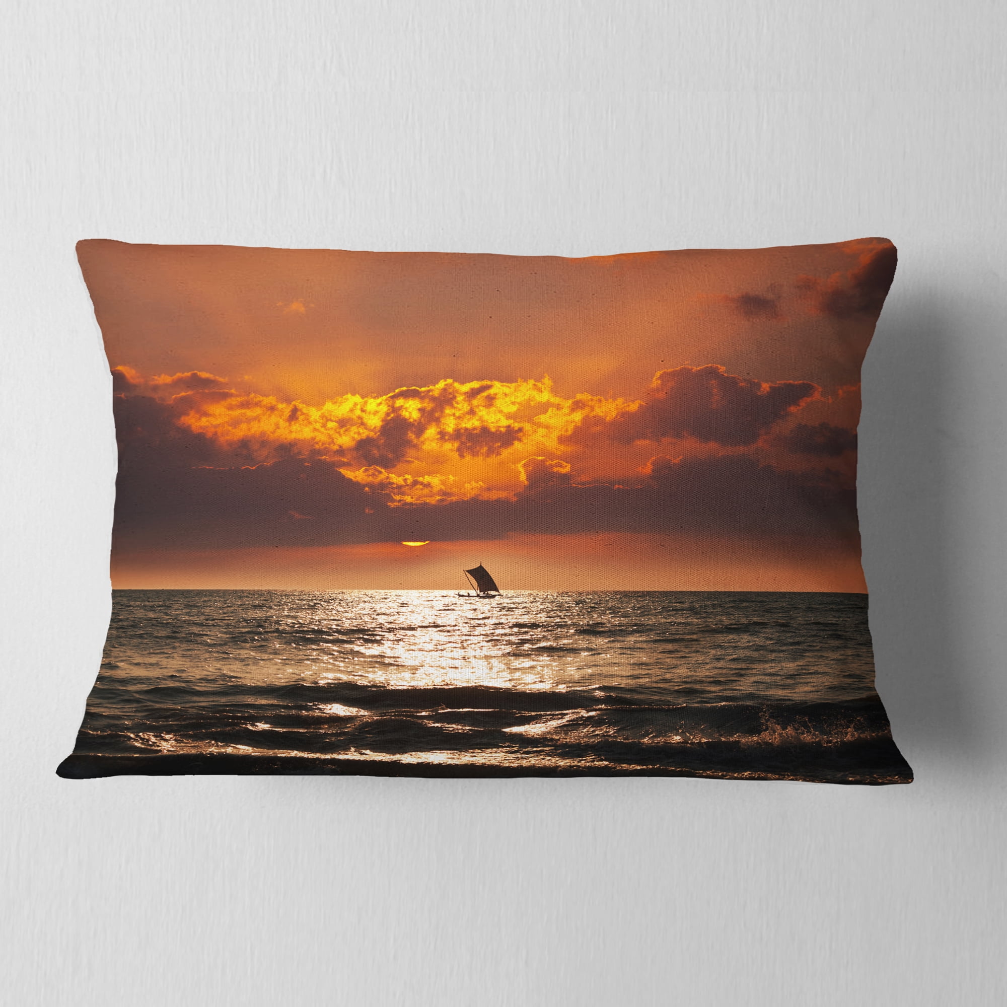 Designart Sunset Beach with Distant Sail Boat - Seashore Throw Pillow - 12x20