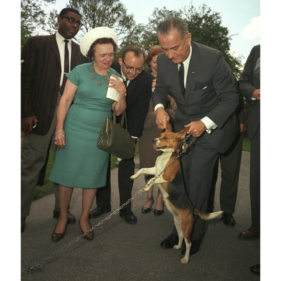 President Lyndon Johnson Holds His Beagle Up By The Ears As Members Of The Press Look On. May 4 History
