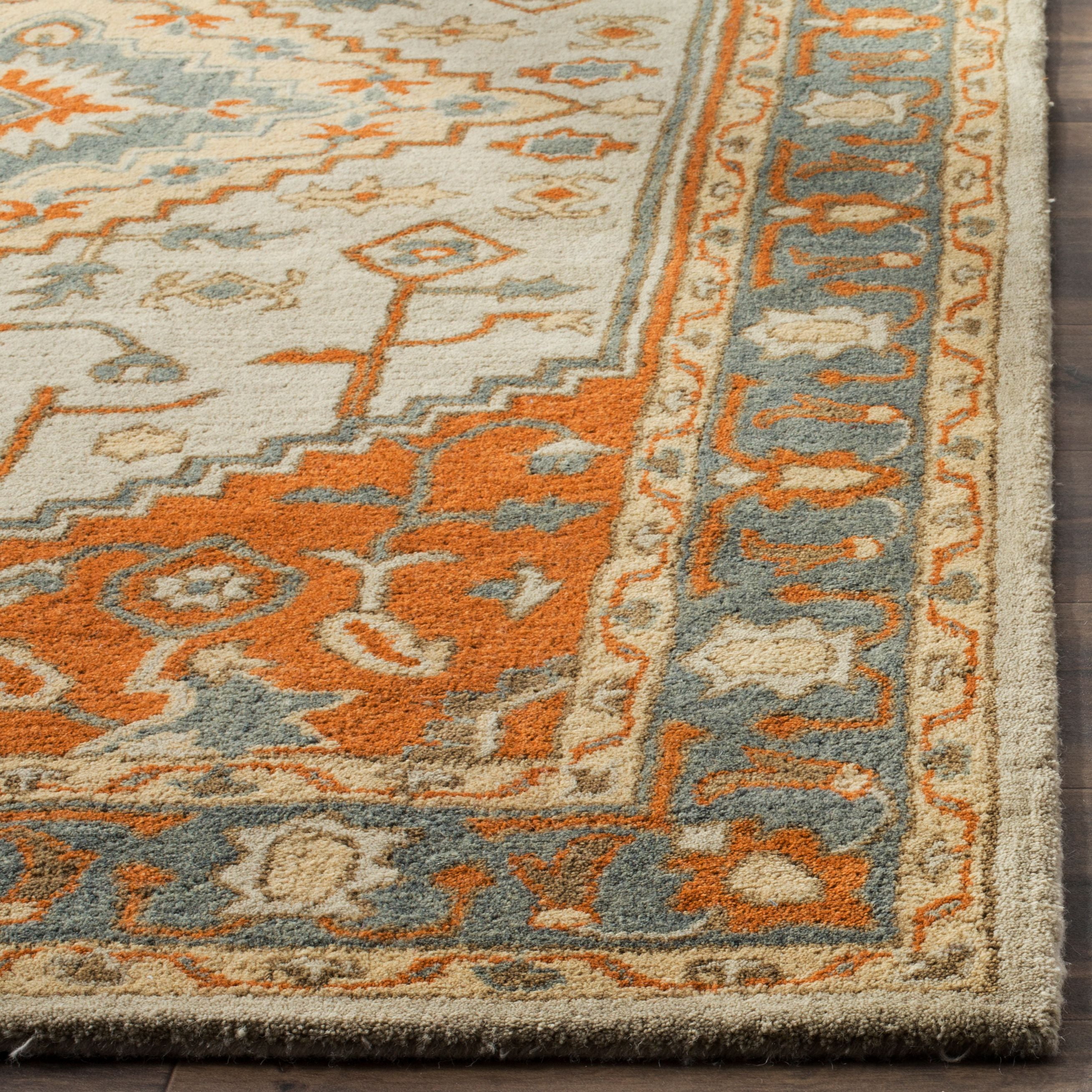 SAFAVIEH Heritage Nita Traditional Wool Area Rug, Light Blue/Rust, 5' x 8'