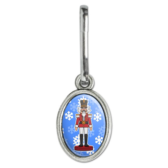 Grinning Nutcracker Soldier with Snowflakes Antiqued Oval Charm Clothes Purse Suitcase Backpack Zipper Pull Aid