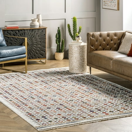 nuLOOM Posie Geometric Stripe Fringe Accent Rug  2  x 3  7   Beige Stylish and versatile this global-inspired pattern is full of character and is sure to stand out. Machine-made with durable synthetic fibers  this rug is built to last and will withstand regular foot traffic.