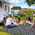 thumbnail image 5 of Funslane 9x18' Outdoor Rug, Reversible Plastic Patio Rugs with Storage Bag, Portable Modern Waterproof Outside Carpet for Camping, Balcony Deck Backyard, Black & Gray, 5 of 9