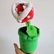 thumbnail image 2 of CHAO Mario comiendo piraña en maceta muñeco de peluche de juguete pequeño -23cm, 2 of 4