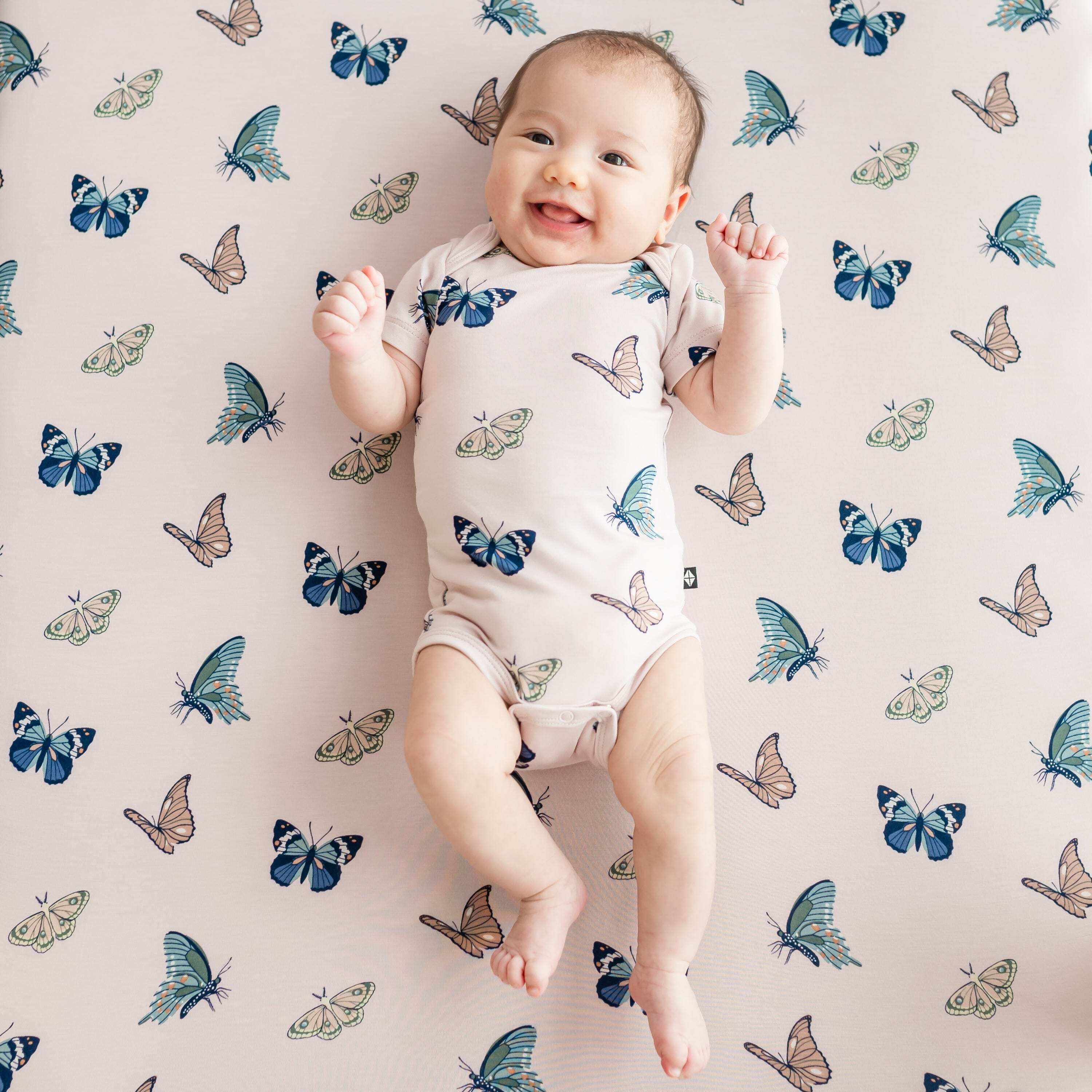 Kyte Baby Crib Sheet in Blush Butterfly