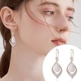 thumbnail image 1 of Exquisite Earrings Featuring Ear-shaped Personality Hooks with Geometric Design and Small Red Opal for a Distinctive, 1 of 6