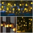 thumbnail image 3 of FloreceBien - Cadena de luces solares para exteriores, 35,6 pies, 60 luces LED en forma de globo, impermeables, 8 modos, para jardín, patio, cenador, jardín, exterior (blanco cálido), 3 of 7