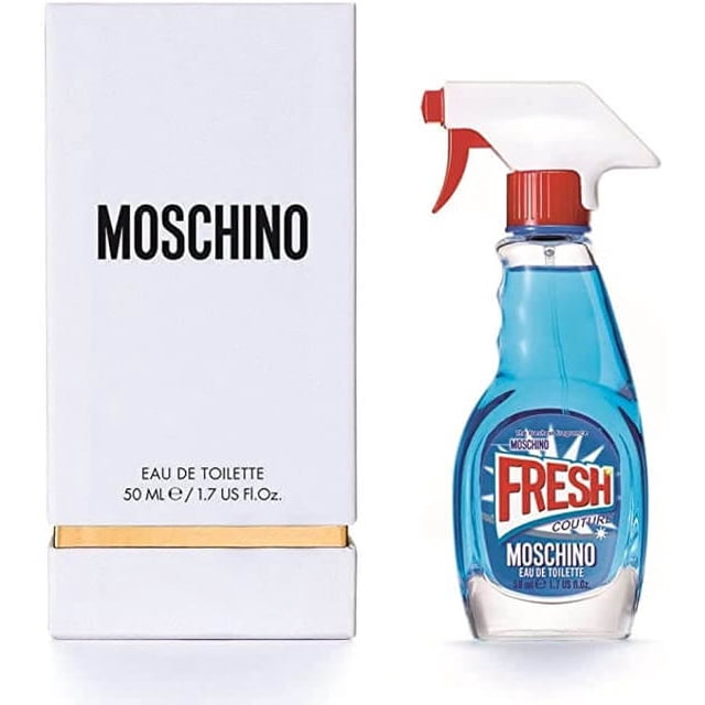 perfume fresh couture para mujer de moschino edt 50ML frasco azul con forma de rociador doméstico y etiqueta roja “FRESH”, tapa rociadora blanca y roja; caja blanca vertical con logo MOSCHINO en negro; fragancia floral frutal lanzada en 2015 por Alberto Morillas; a menudo usado también como pieza decorativa de tocador.