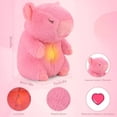 thumbnail image 1 of PELUCHE CAPIBARA PARA ANSIEDAD DORMIR MÚSICA RESPIRACIÓN COLOR ROSA, 1 of 4