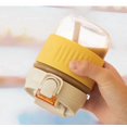 thumbnail image 4 of Glass Coffee Mug With Spill Proof Lid & Straw - 350ml, Yellow | Reusable Glass Coffee Cup With Two Drinking Options - Glass Travel Mug With Silicone Sleeve | Leak Proof, Non-slip & Easy To Clean, 4 of 5