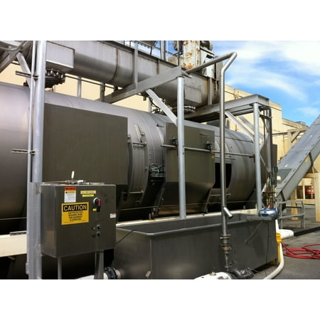 LAMINATED POSTER One of the large membrane tank presses at at Columbia Crest winery in Patterson, Washington. Poster Print 24 x