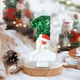 thumbnail image 2 of Xihbxyly Vela de Papá Noel Verde y Blanca con Diseño de Muñeco de Nieve y Sombrero Rojo, Hecha a Mano con Polvo Brillante, Empaque de Pet Transparente, Decoración Navideña, Tamaño 4 X 7,5 Cm, 2 of 5