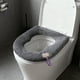 thumbnail image 5 of Cubierta de asiento de váter mullida en forma de calabaza • Tela de forro polar • Cálida y suave • Mango extraíble • Encaja en 42x37cm • Morado, gris, rosa • Comodidad para todo tipo • Fácil de, 5 of 6