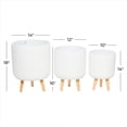 thumbnail image 3 of CosmoLiving by Cosmopolitan 18", 16", 14"H Indoor Outdoor White Magnesium Oxide Planter with Wood Legs (3 Count), 3 of 13