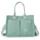 thumbnail image 3 of Bolso de hombro de moda con múltiples bolsillos de lona para mujer bolso de viaje cuadrado de color sólido, 3 of 7