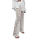 thumbnail image 1 of Pantalones transparentes de encaje de cintura alta para mujer: patchwork de malla, pierna ancha, cintura elástica, ropa sexy para discotecas, fiestas y salidas nocturnas, 1 of 4