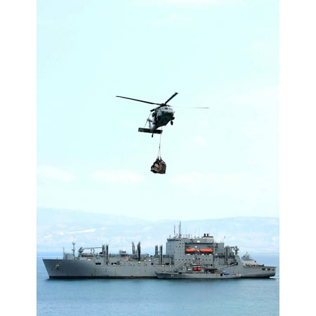 Military Sealift Command Ships - LAMINATED POSTER An MH-60S Sea Hawk departs the Military Sealift Command dry cargo/ammunition ship USNS Sacagawea to Poster Print 24 x 36