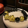 thumbnail image 1 of Feng Shui Bracelet with Adjustable Strings  12 mm, 1 of 3