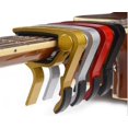 thumbnail image 1 of Cejilla de guitarra versátil, optimizada para diferentes mástiles de guitarra, mecanismo fácil de usar para cambios rápidos de trastes, almohadilla de silicona suave para el mástil que ofrece, 1 of 4