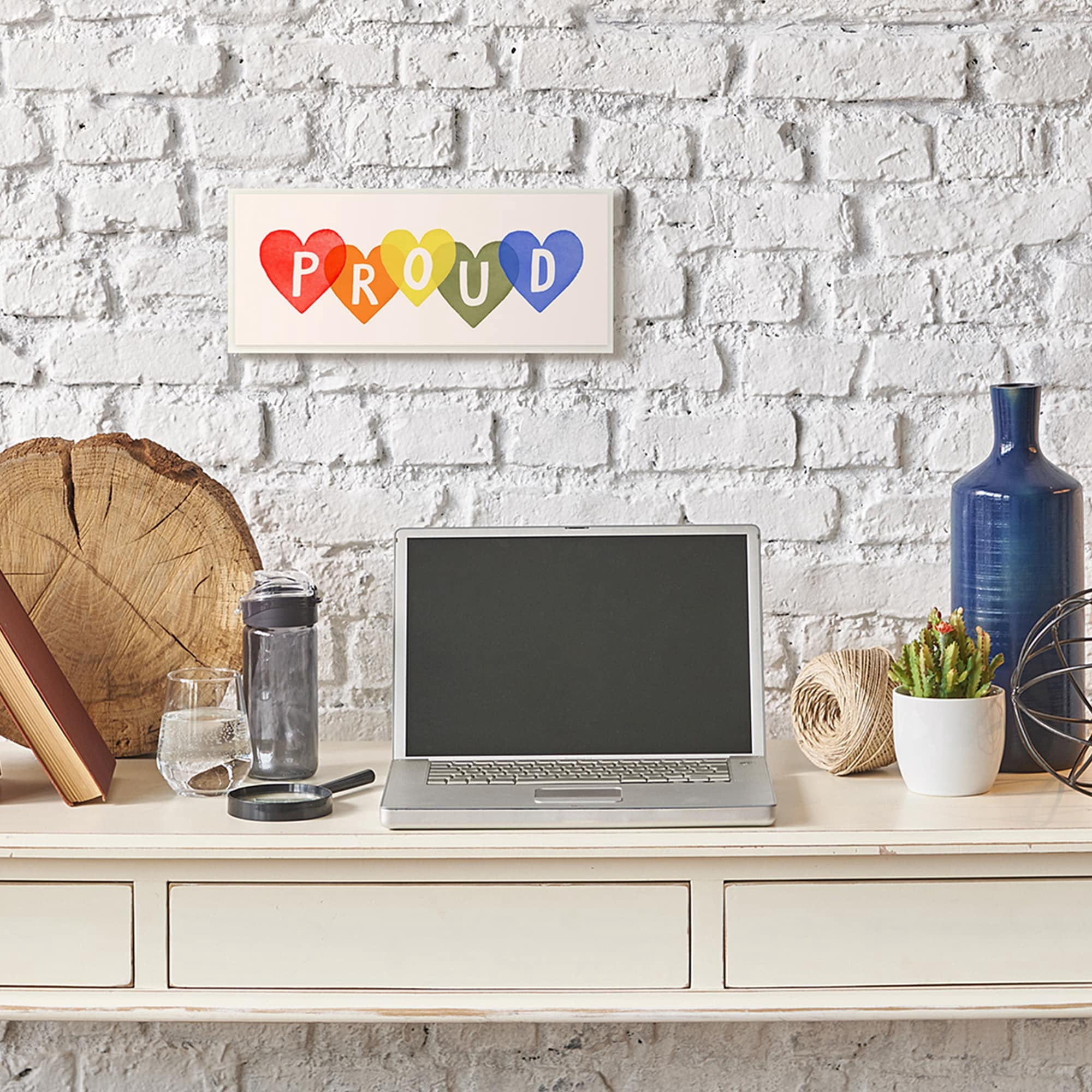 Stupell Industries Proud Text Bold Rainbow Heart Pattern Wall Plaque by Victoria Barnes