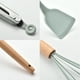 thumbnail image 5 of Juego de 9 utensilios de cocina en silicona con mangos de madera verde, ideal para cocinas modernas y seguras., 5 of 7