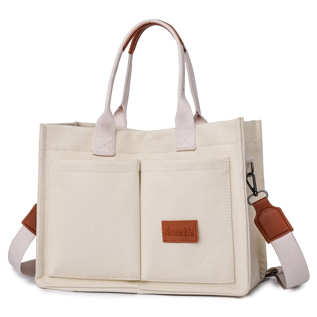 bolso mano lona ygjytge retro gran capacidad mujer 1123 beige bolso cruzado importación con vista frontal centrada; lona beige rectangular de 340x250x140 mm, dos asas superiores, correa desmontable y ajustable, dos bolsillos frontales externos y parche marrón con logo, herrajes metálicos y remates en símil piel marrón. Adecuado para uso diario, compras y viajes; a menudo también usado para organizar accesorios en viajes cortos.