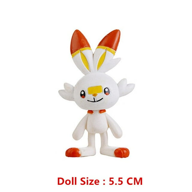 figura de anime de pokémon de 3,5-5 cm, modelo de colección de Pikachu Charizard Lucario, figura Scorbunny en PVC de 3.5–5 cm vista frontal, de pie con orejas largas blancas y puntas naranjas, ojos y detalles pintados, parche amarillo en la frente y patas naranjas sobre fondo blanco; adecuada como figura de colección y regalo para niños mayores de 3 años.