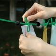thumbnail image 3 of Retractable Windproof Clothesline with 12 Clips, 70.87in Heavy-Duty Elastic Rope for Indoor/Outdoor Drying, Portable Travel Laundry Line, 3 of 6