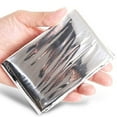 thumbnail image 5 of Silver Reflective Emergency Blanket 51x83in (130x210cm), Waterproof Sunscreen Insulation Mylar Film - Portable Lifesaving Blanket for Camping, Outdoor Survival, Car & Home First Aid, 5 of 7
