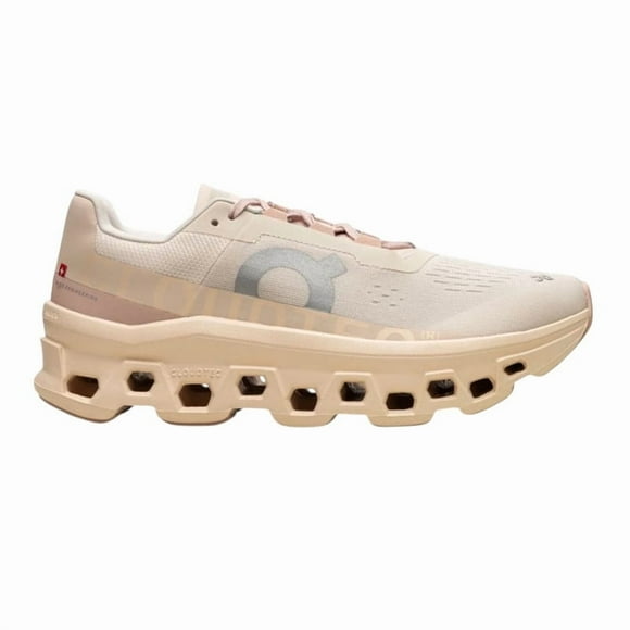 Tenis On Cloud Cloudmonster para mujer color rosa con suela de goma y agujetas.