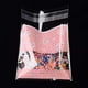 thumbnail image 2 of Bolsas de celofán OPP rectangulares rosas genéricas de 14x9,9 cm (95-100 unidades) para envolver regalos de aniversario., 2 of 3