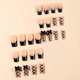 thumbnail image 3 of Uñas postizas adhesivas Quezadyl French negras con moño y pedrería, 24 piezas, 3 of 7