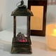 thumbnail image 5 of Lámpara de Llama de Halloween, Efecto de Chimenea Simulada, Linterna a Pilas, Decoración de Carbón Negro, Ambiente de Festival Fantasma, Ideal para Sala de Estar y Dormitorio, Tamaño 5 X 5 X 13 Cm, 5 of 7