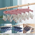 thumbnail image 4 of Perchas de ropa plegables, organizadores de armario, resistentes al viento, multifuncionales, para el hogar, con 29 pinzas, tendedero retráctil de ratán, 4 of 5