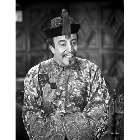 A film still of Peter Sellers wearing a Chinese costume Photo Print