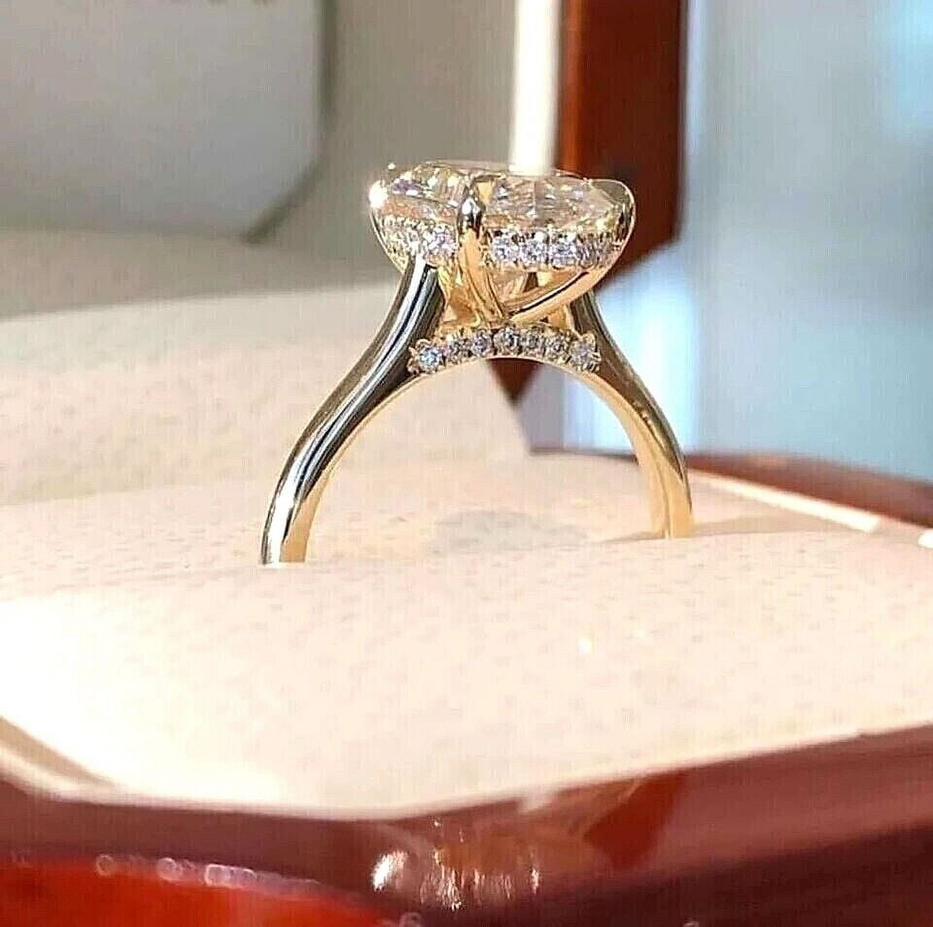 2CT Oval-Cut Lab Created Diamond Hidden Halo Engagement Ring 14K Yellow Gold Plated Silver