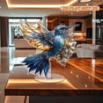 thumbnail image 6 of Rotating acrylic ornament featuring a stunning blue and gold hummingbird with intricate stained glass details on a white background, designed for elegance, 6 of 7