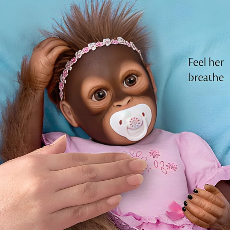 The Ashton - Drake Galleries Cooing Cora Baby Girl Monkey Doll