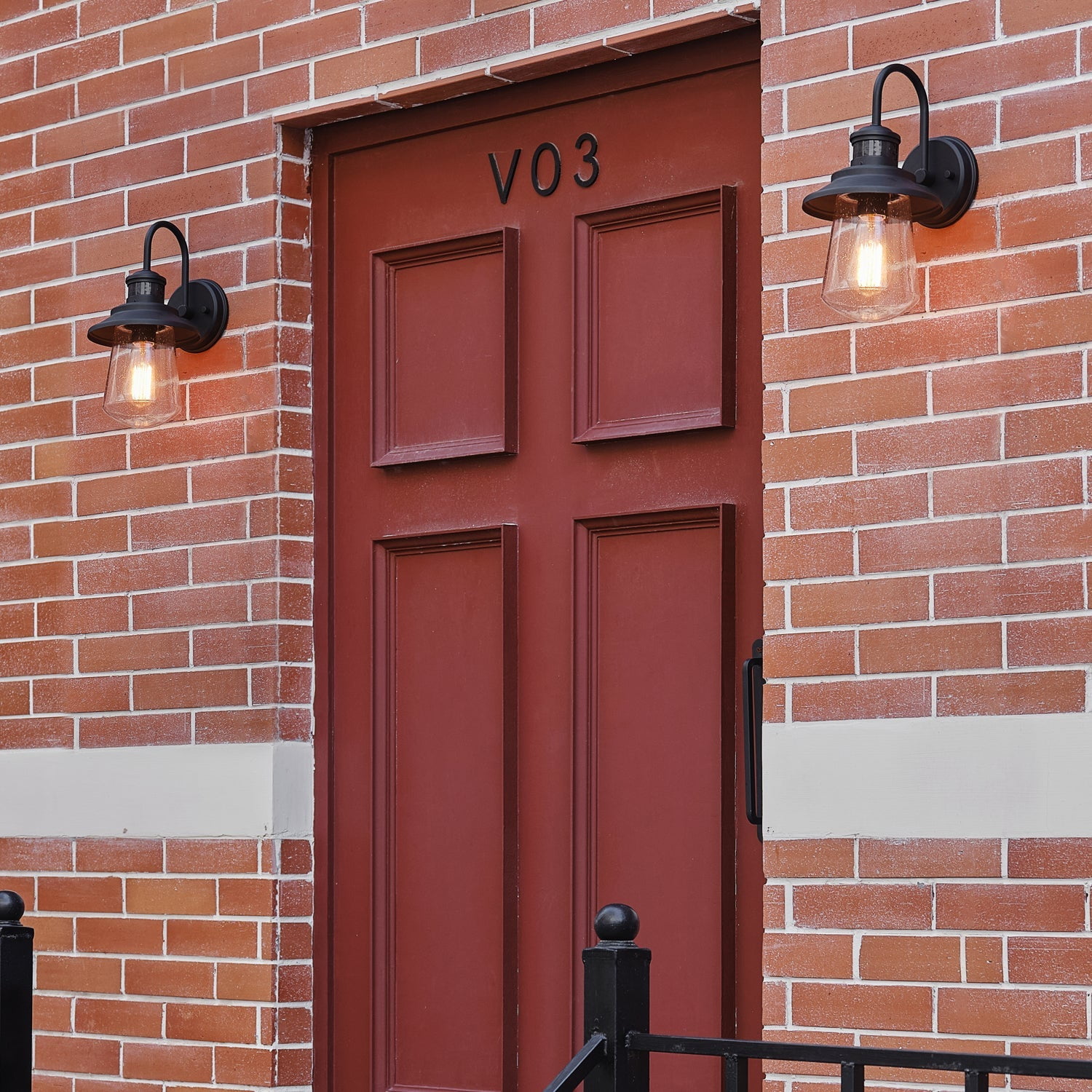 Globe Electric Mariner 1-Light Matte Black Motion Activated Outdoor Wall Sconce with Seeded Glass Shade