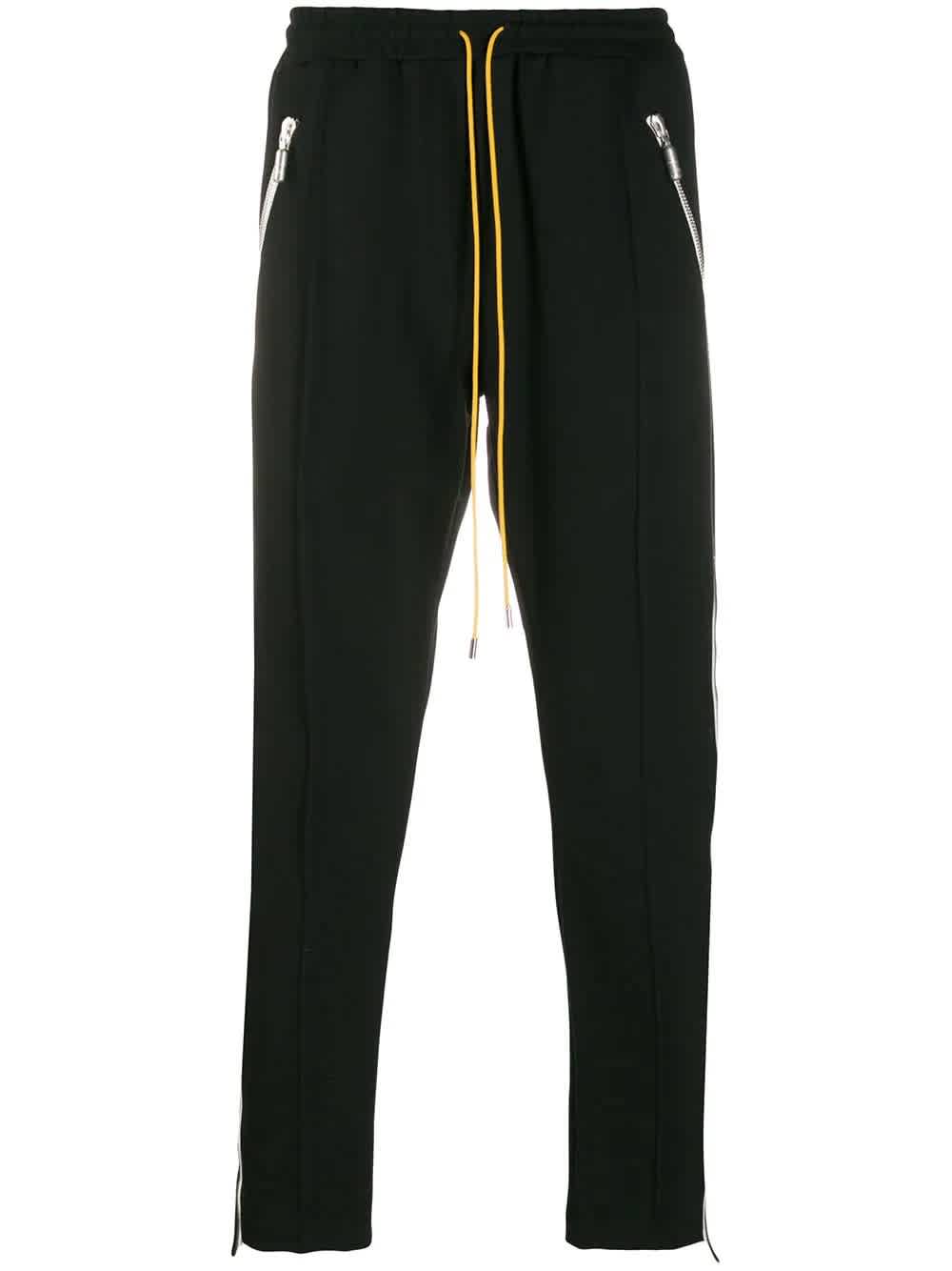 black pants with green side stripe