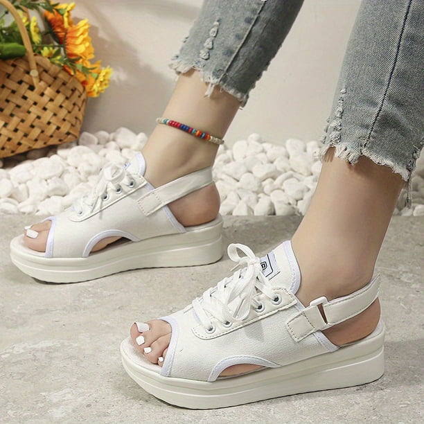 Elegantes sandalias de plataforma con talón abierto para mujer: corte de punta abierta, cordones y cierre de gancho y bucle para mayor comodidad y estilo.