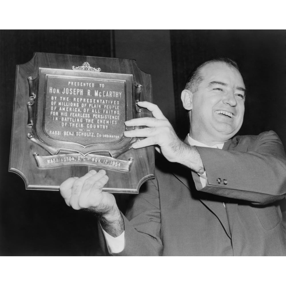 Wisconsin Senator Joseph Mccarthy Displays A Plaque Honoring Him '���For His Fearless Persistence In Battling The Enemies