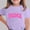 Purple, variant on Amidoa Girls Short Sleeve Graphic Crewneck T-shirt Summer Casual Cute Soft Tops Pink,5-6Years
