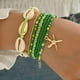 thumbnail image 1 of Pulsera tejida con cuentas de arroz blanco hecha a mano con cordón azul de concha y tortuga tejida para mujer, 1 of 6
