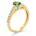 thumbnail image 3 of Gem Stone King 10K Yellow and White Gold Oval Green Peridot and White Lab Grown Diamond Engagement Ring for Women (0.68 Cttw, Gemstone August Birthstone, Available in Size 5, 6, 7, 8, 9), 3 of 4