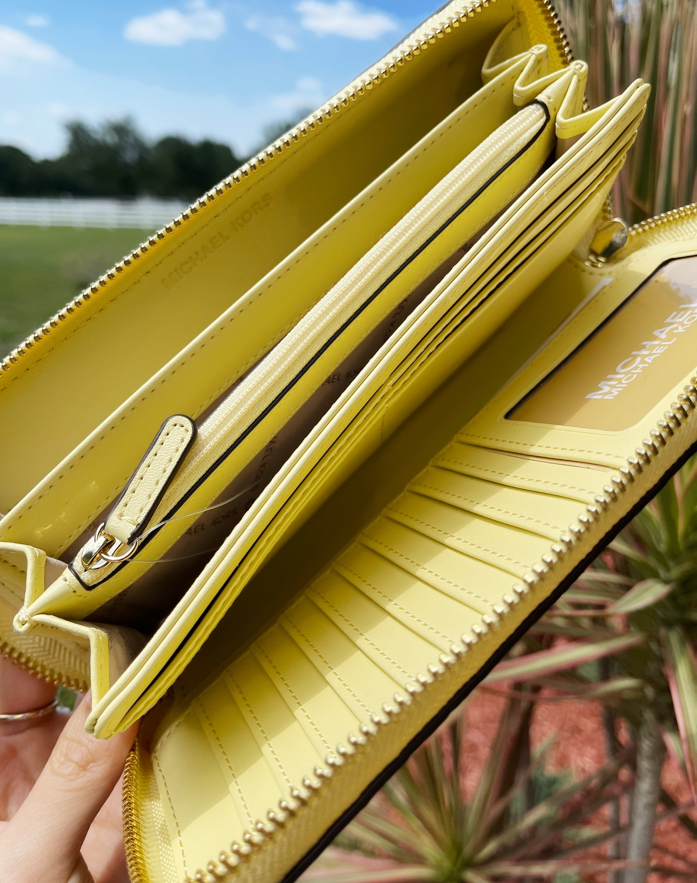 yellow michael kors wristlet