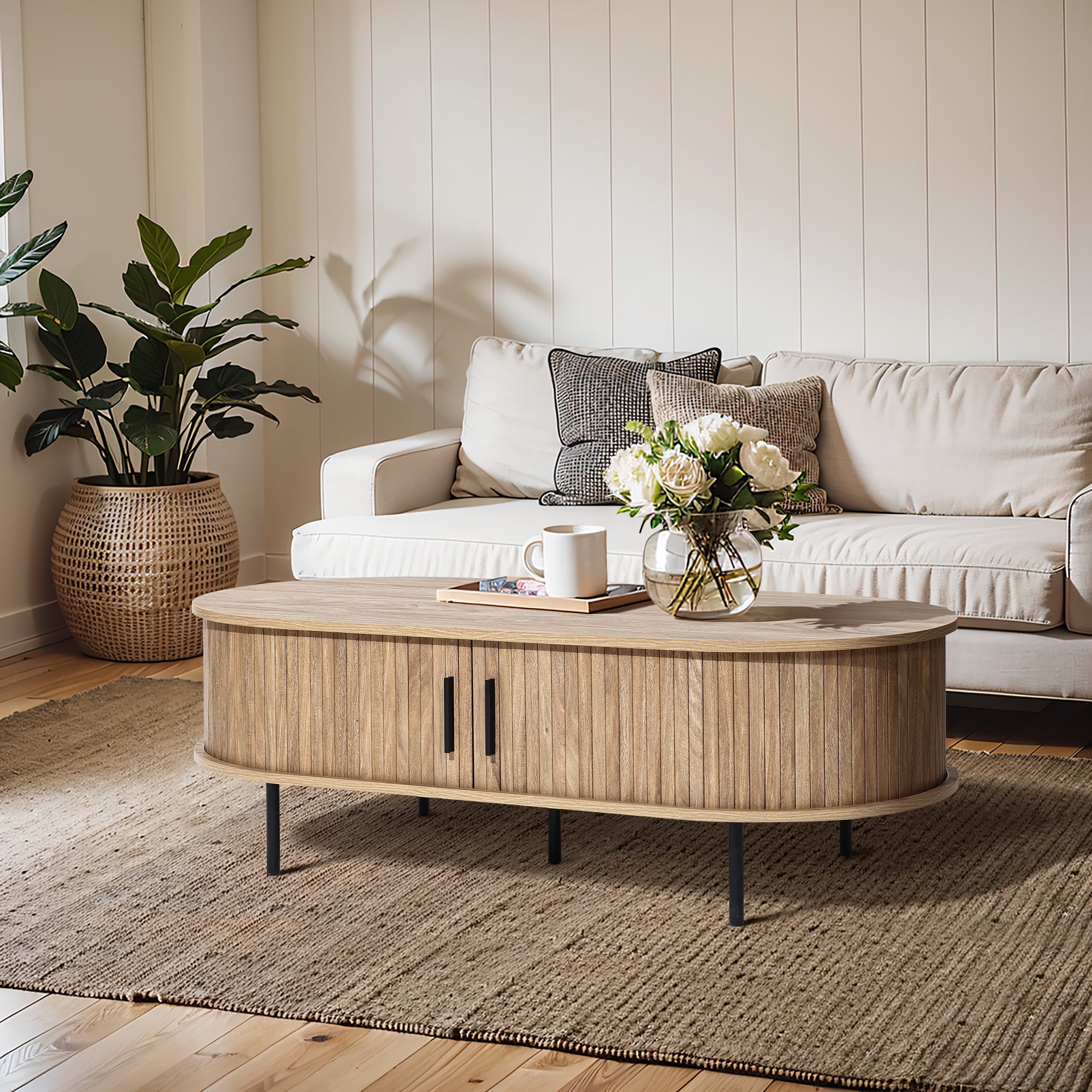 LuxenHome Oval Coffee Table with Storage, 47" Mid Century Modern Fluted Coffee Tables for Living Room, Wooden Sliding Door Boho Storage Center Table for Home, Office