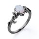 thumbnail image 3 of JeenMata Inspirado en la Naturaleza: Ópalo Arcoíris de Forma Ovalada de 0,5 Quilates, Anillo de Compromiso con Engaste de Cuatro Puntas, Baño de Oro Negro de 18 K sobre Plata, 3 of 5