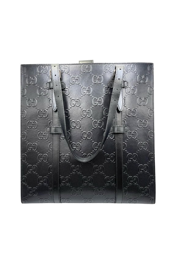 Pre-Owned Gucci GG embossed perforated leather handbag in black for women (Good)