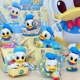 thumbnail image 4 of Figuras periféricas de anime de la serie Childlike Heart del 90.º aniversario del pato Donald de Disney, kit de garaje, muñeco para el día del niño, 4 of 5